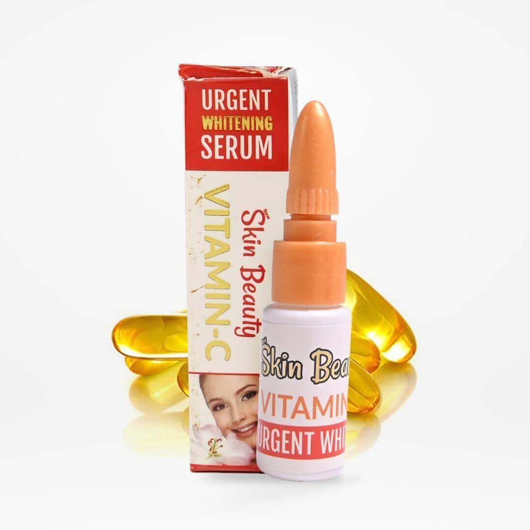 Skin Beauty Vitamin C Urgent Whitening Serum in a branded box for skincare and radiance enhancement.